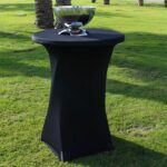 mesa allta con funda negra y cubitera de acero inoxidable