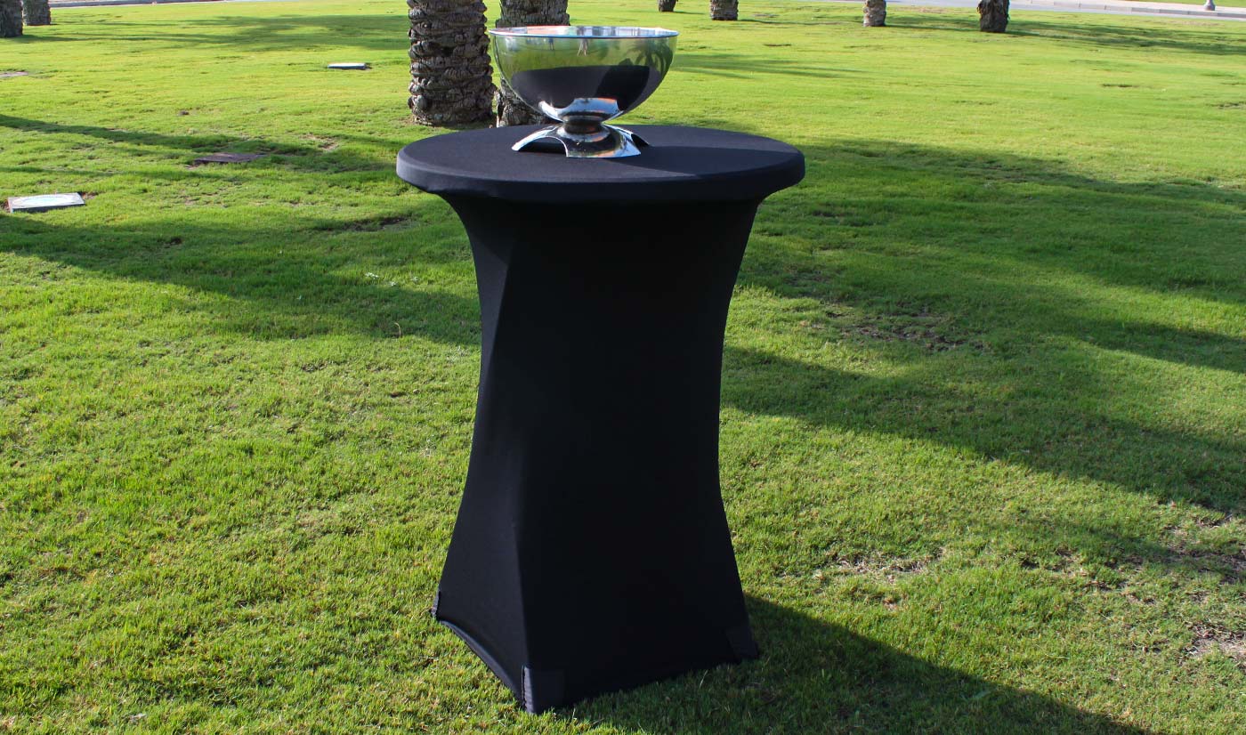 mesa allta con funda negra y cubitera de acero inoxidable